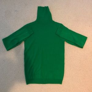Green ribbed turtleneck sweater